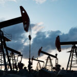 Iran War Oil Prices : Oil tanker passing through the Strait of Hormuz as global oil prices surge amid Iran conflict